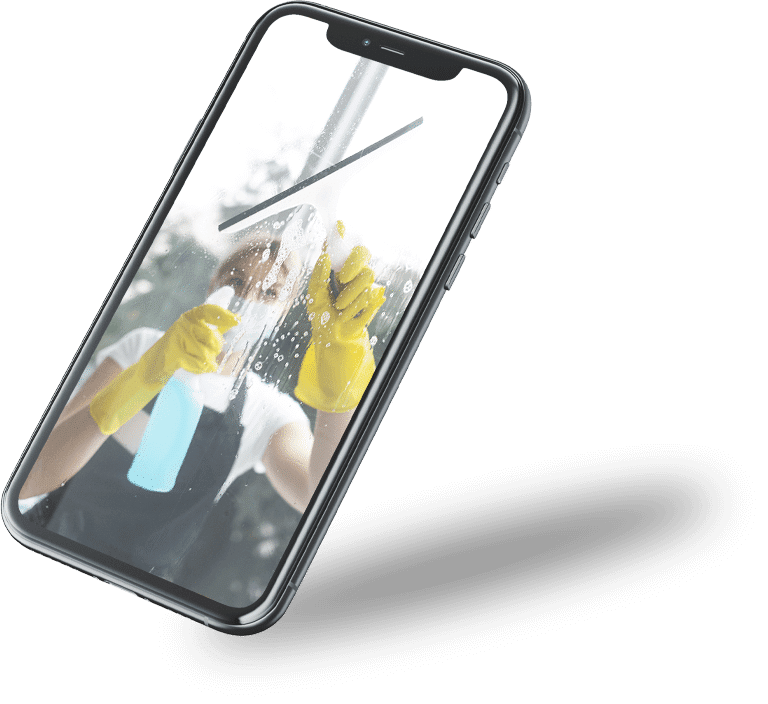 cellulare mostra un'addetta alle pulizie che pulisce una vetrata